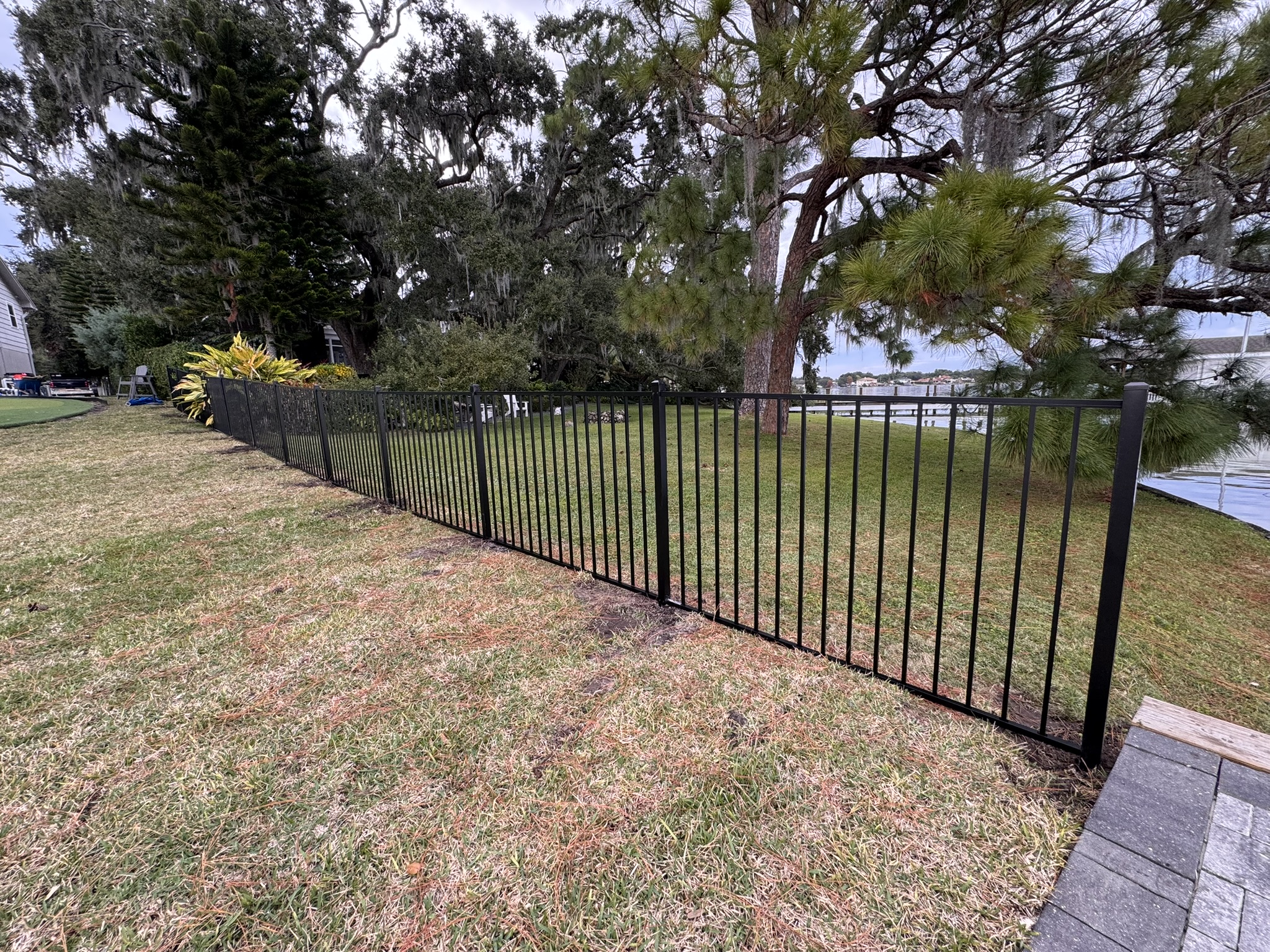 Modern Elegance in the Heart of the City: Black Aluminum Fence Installation in Downtown Orlando