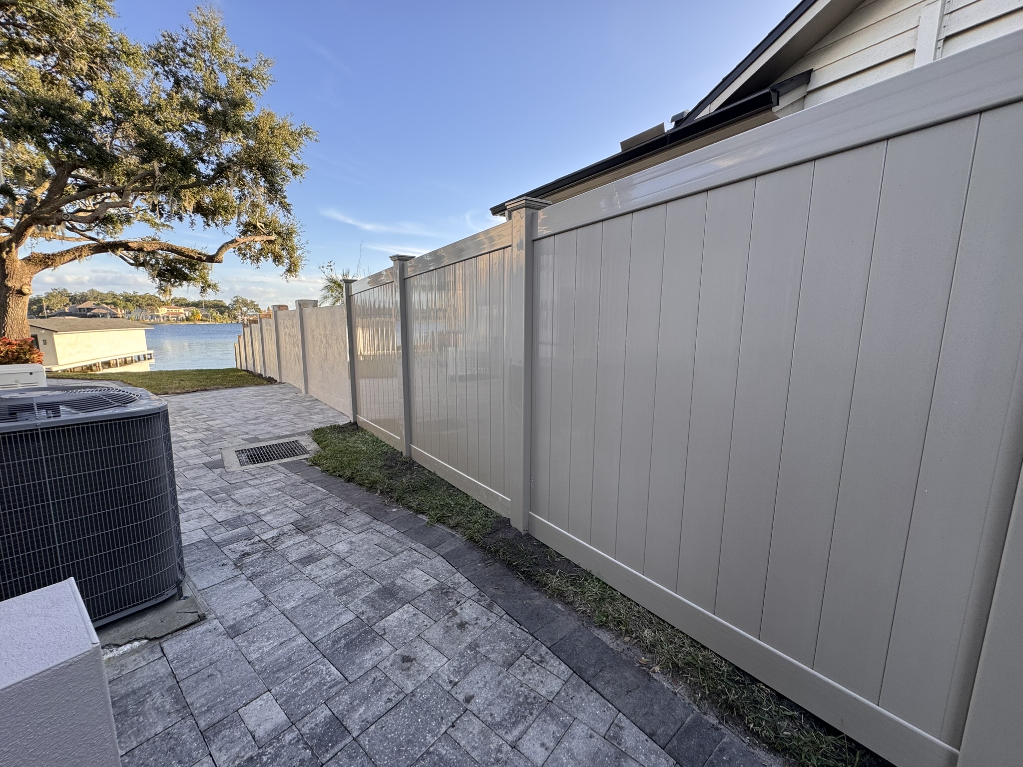 Enhancing Curb Appeal: A Tan Vinyl Fence Installation in Downtown Orlando