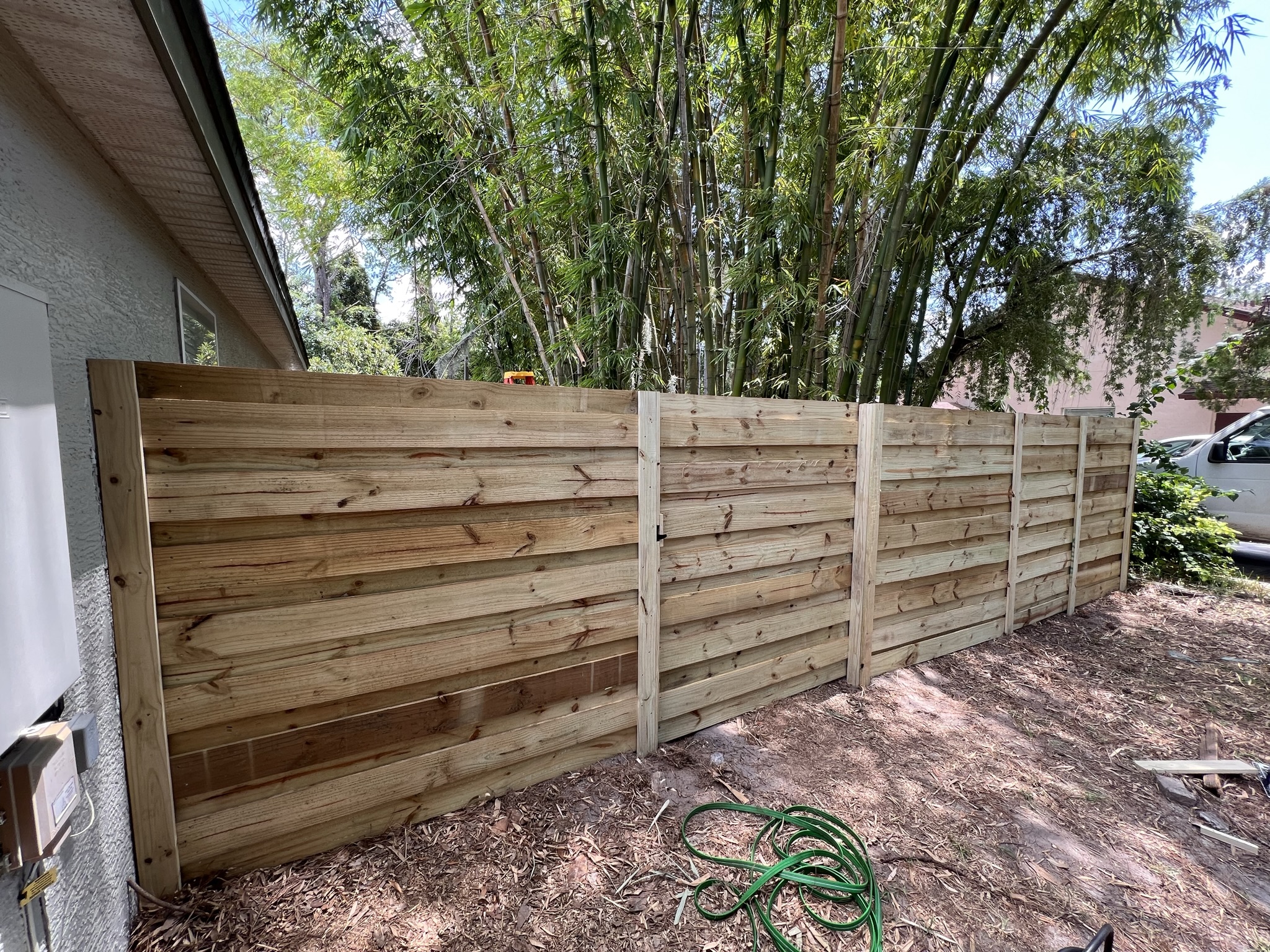 Custom Horizontal Board on Board Wood Fence Installation in Saint Cloud, FL: The Ultimate Privacy Solution